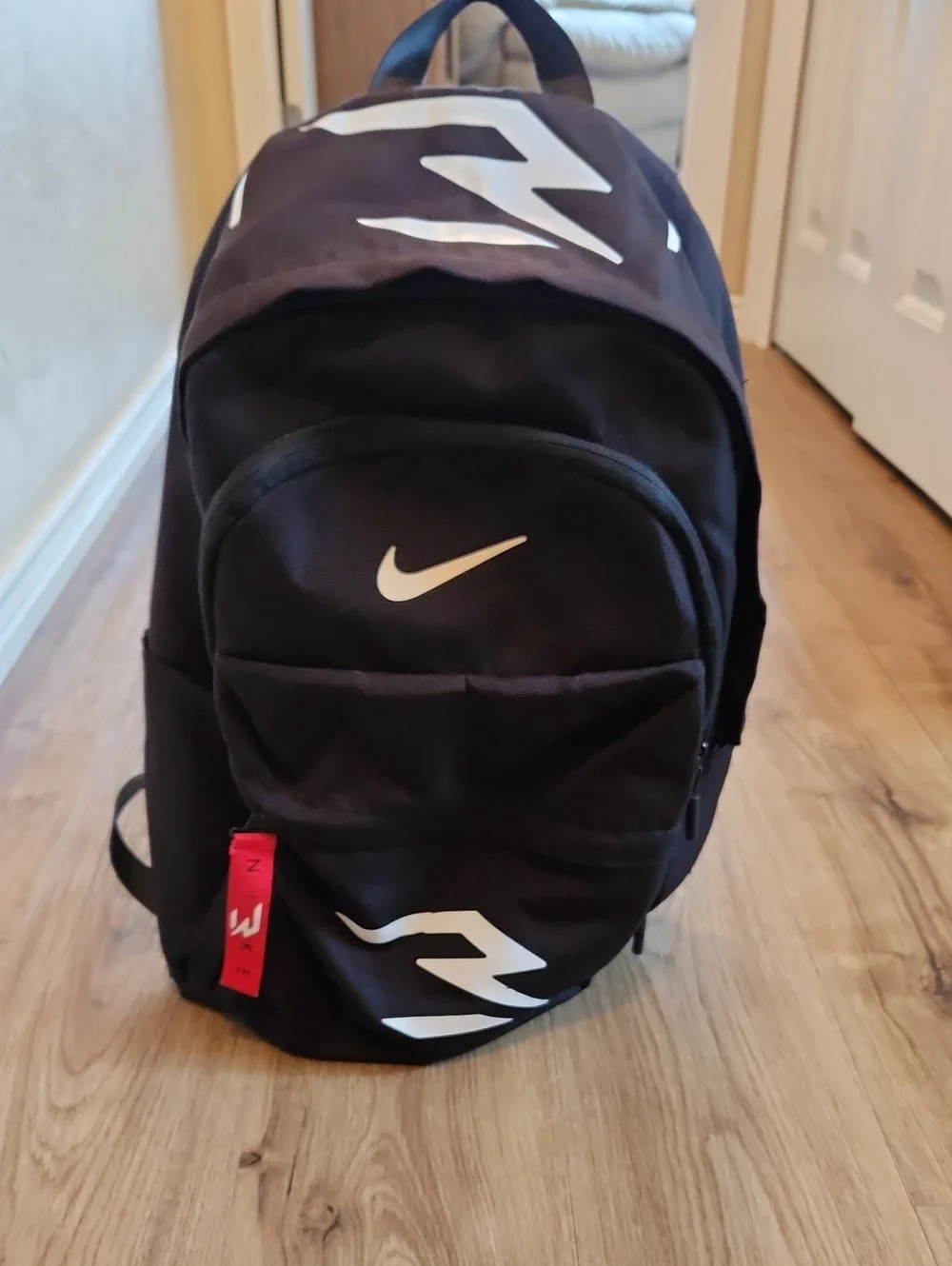 NWOT Nike Black Backpack with White Logo Accents